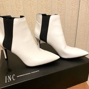 SOLD White for winter ankle low heeled boot. Never worn. Size 6M.